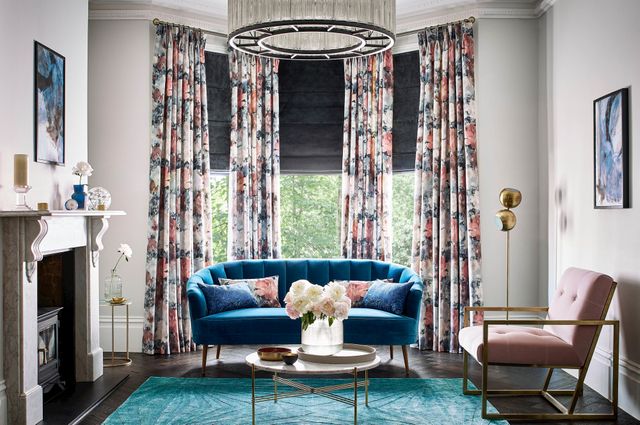 full length floral curtains in an elegant living room window 