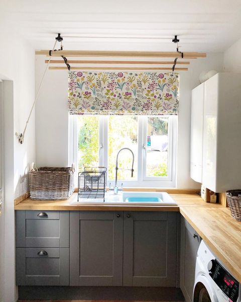 floral print on white roman blind in kitchen