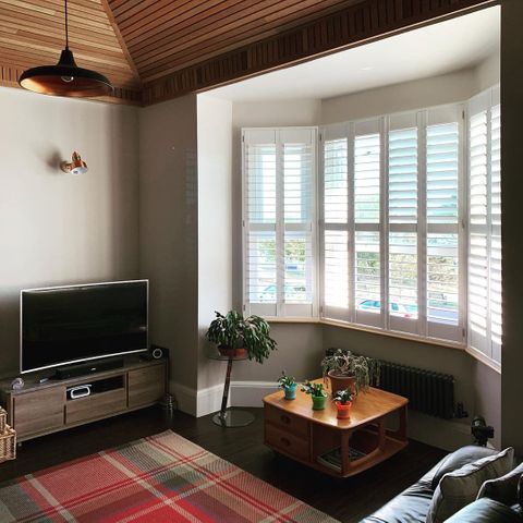 white shutters in a living room