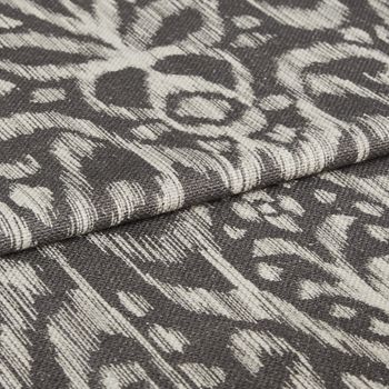 Indah smoke fabric swatch featuring white boho pattern on dark grey background