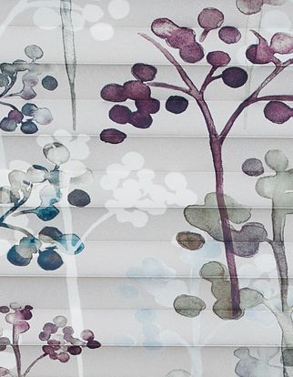 White fabric patterned with trees in purple or blue