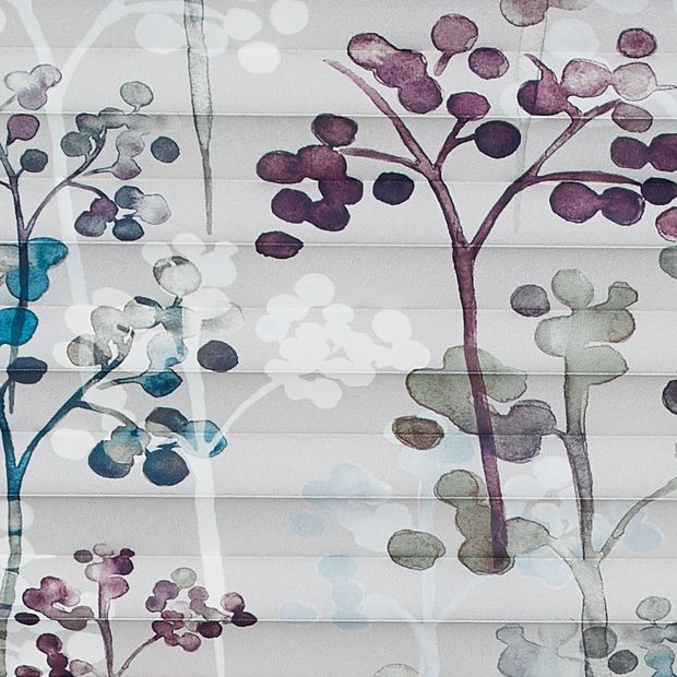 White fabric patterned with trees in purple or blue