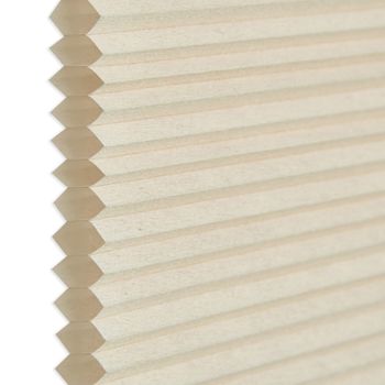 Side view showing honeycomb in Cream swatch for pleated blinds