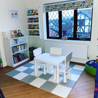 jungle book safari printed roller blinds installed on windows of children play and study room