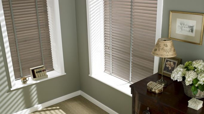 Look at the reasons we give when choosing whether to have faux wood or real wood blinds in your home.