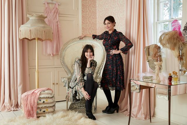 Pearl and Daisy Lowe in large living room regal chair