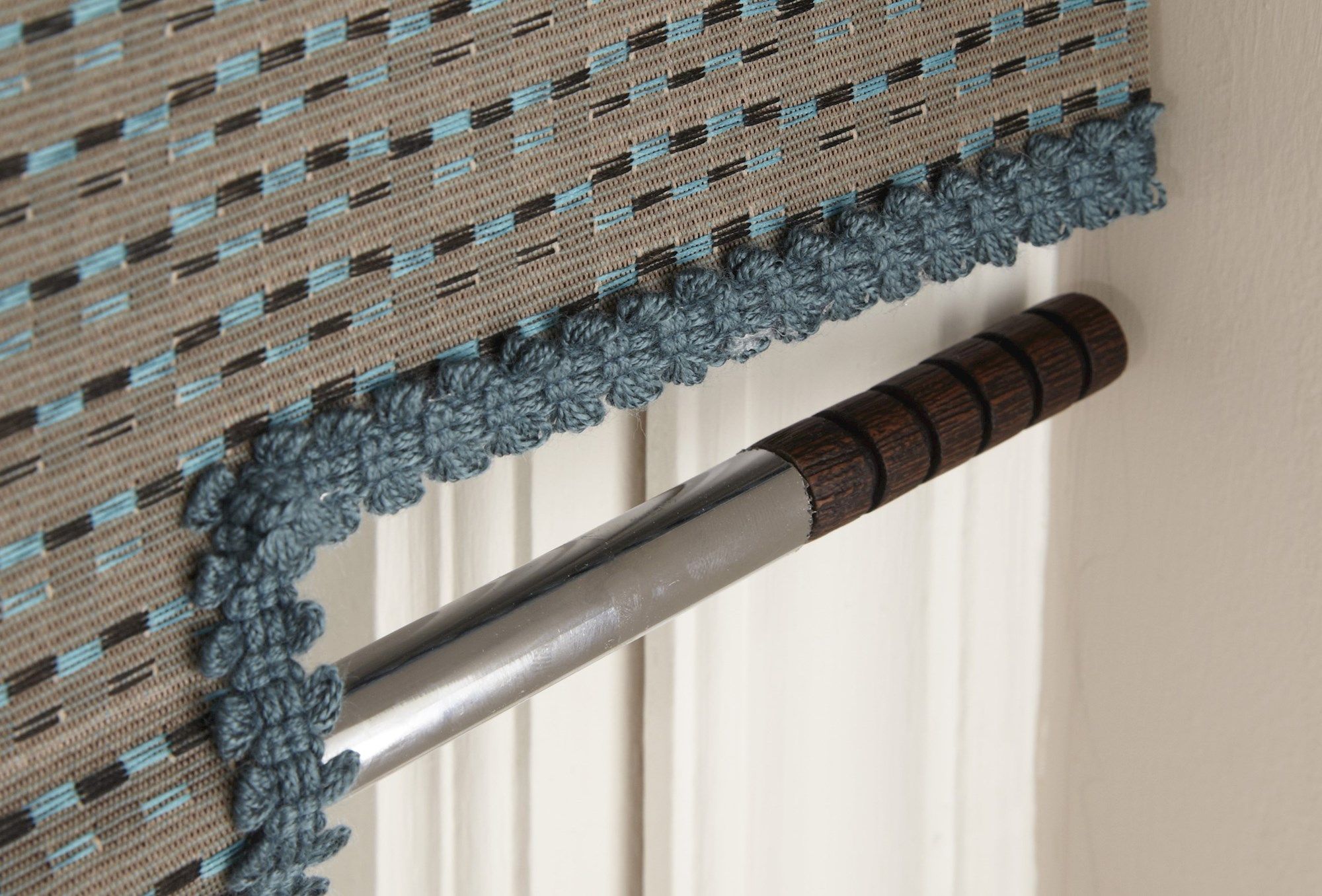 a close up image of the pole for the roller blind