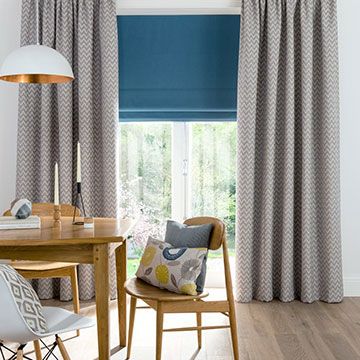 Blue Horizon Mist Curtains and Blue Tetbury Wedgewood Roman Blind in the Dining Room