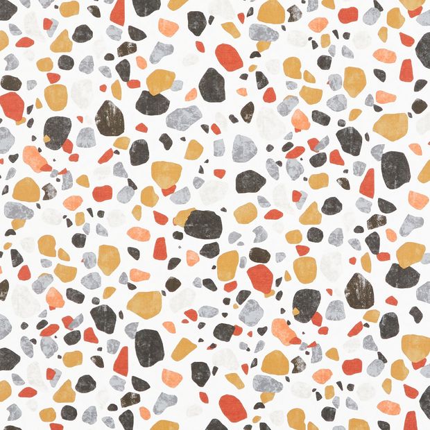 repeating stone pattern in yellow, black, red and grey on white fabric