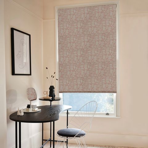The blackout printed Matchsticks Blackout Coral Roller blind allows a small stream of light to pass into this neutral home office space.