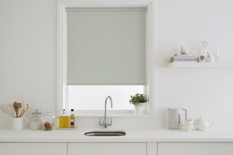 Hexham Silver roller blind above a sink in a modern kitchen