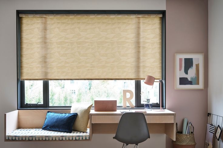 Zara pineapple roller blind in home office window with pastel accessories