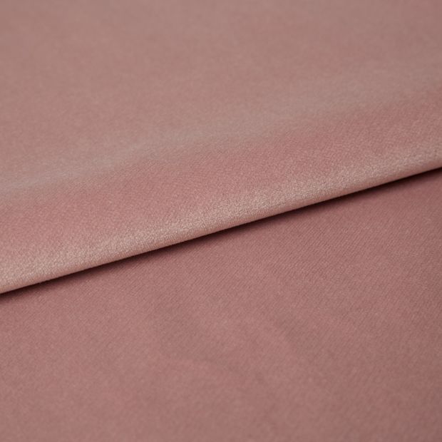 Rose coloured folded Roman Blind and curtain fabric of Darcia Rose