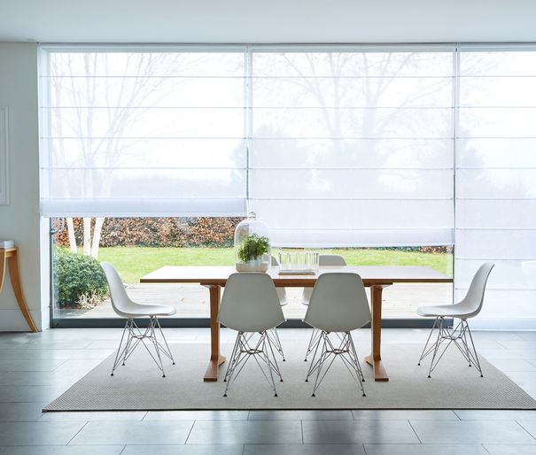 Clarity white Voile roman blinds in large wide dining room window