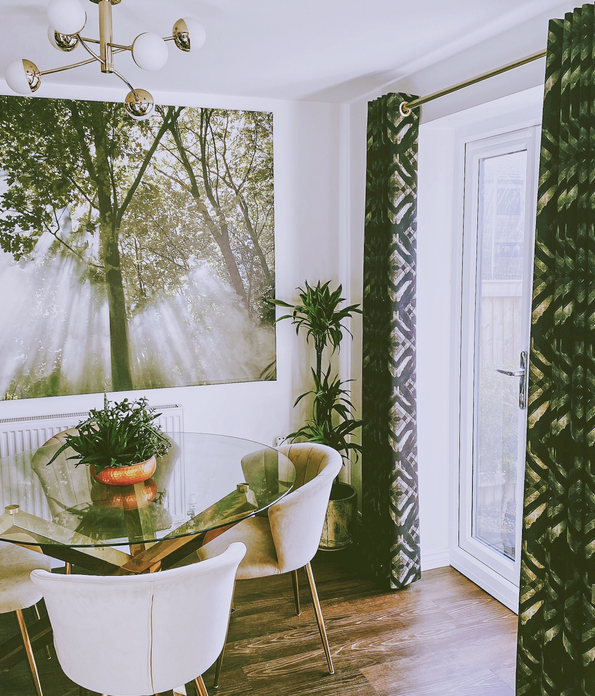 Dark, patterned eyelet curtains in a modern dining room, with a natural theme