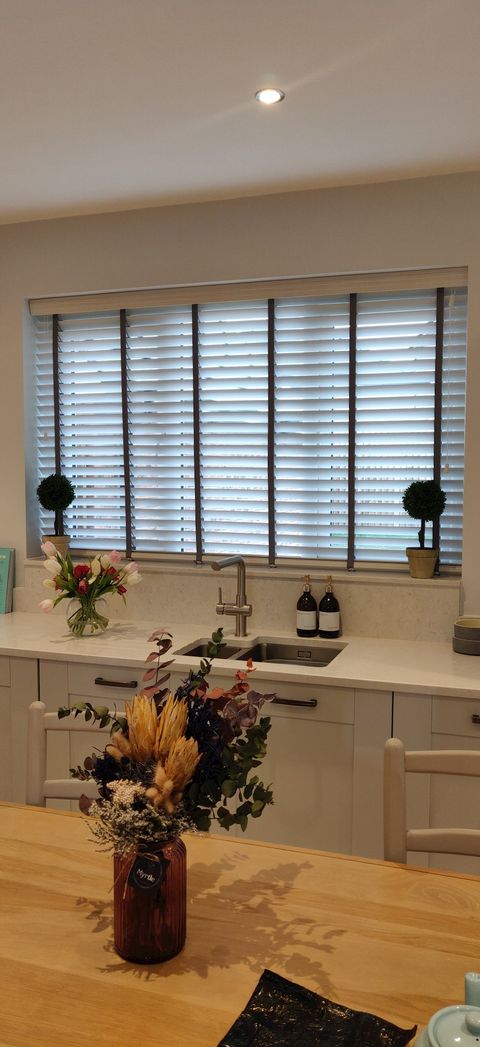 Venetian blinds in a kitchen window