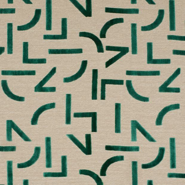 Mori Evergreen swatch is a beige background with juxtaposing sleek lines with organic shapes in an emerald green shade