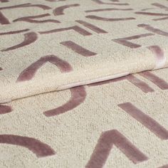 cream and purple patterned fabric swatch called Mori Lilac Blush