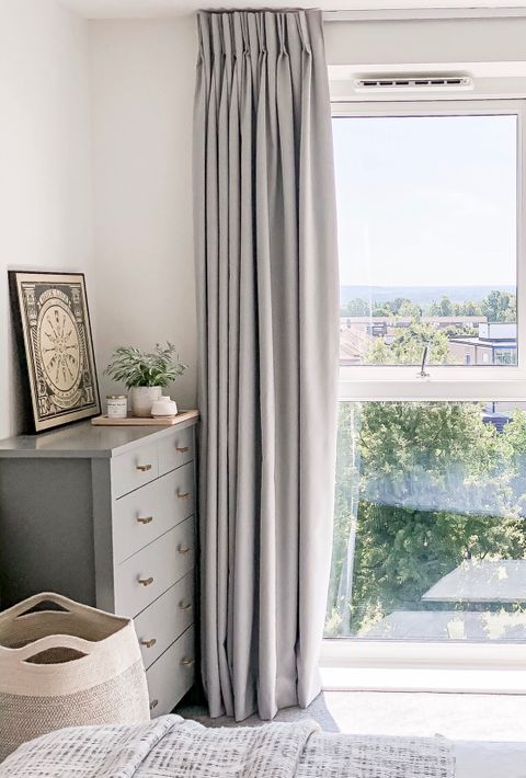 Pinch pleat curtain in a bedroom window