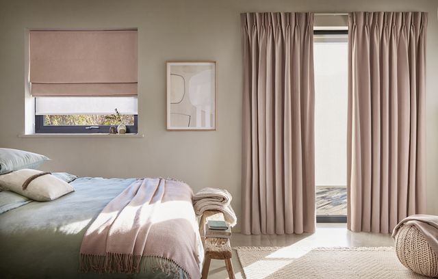 Solace sheer Roman blind and Serene Mauve curtain in a bedroom window