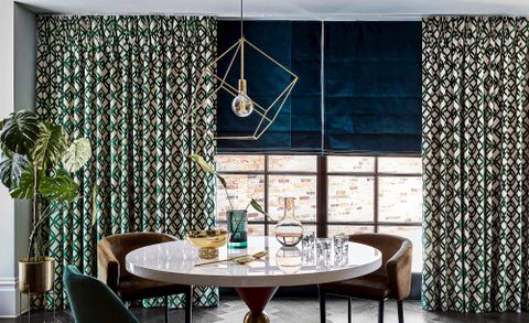 dining room landscape with floor length darcia velvet teal curtains