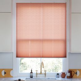 Moreno rust light pink pleated blind in kitchen window with gold tap 