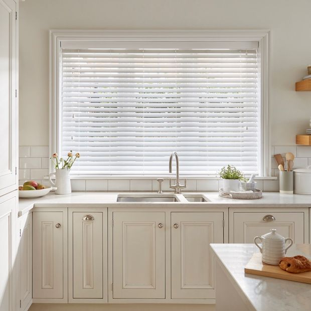 Natural Bamboo Glacier Blinds in a white kitchen