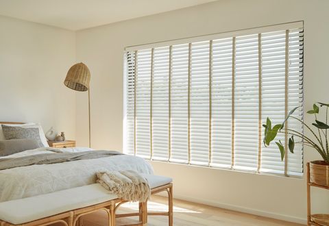 Natural Bamboo Marble blinds in a white bedroom
