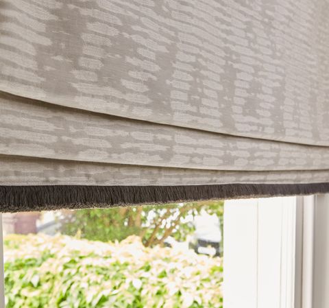 Cadillac fossil roman blinds fitted to a window