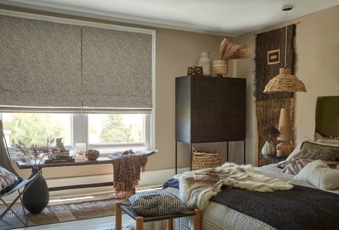 Nola camo roman blinds in cosy rustic bedroom