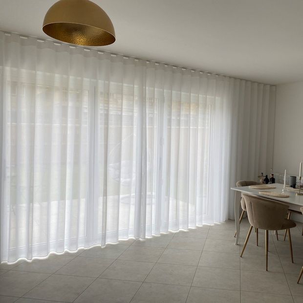 Astro grey voile curtains in dining room