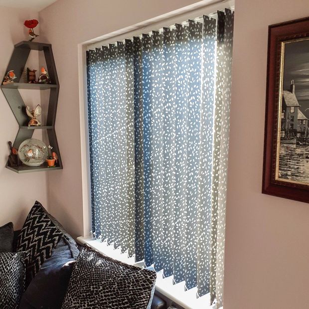 izola jet vertical blinds in bedroom