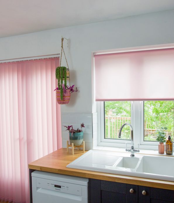 Reber blush roller and vertical blinds in kitchen
