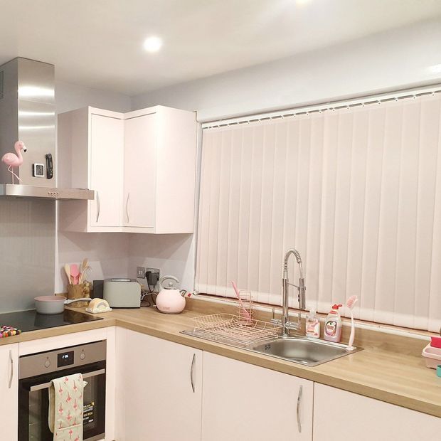 Valerie Pink vertical blinds in matching pink kitchen