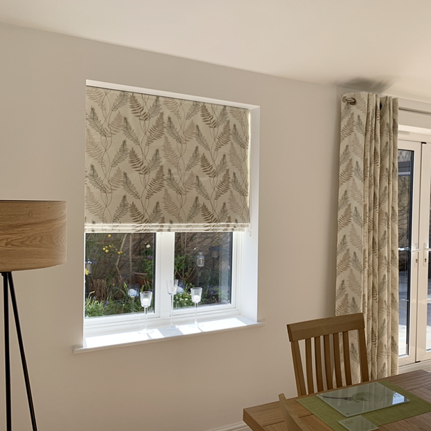 Tranquility bark roman blinds in dining room