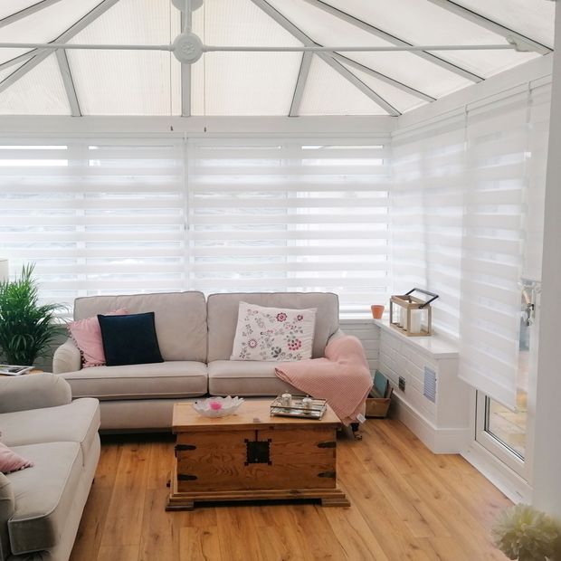 Dawn white day and night blinds in conservatory