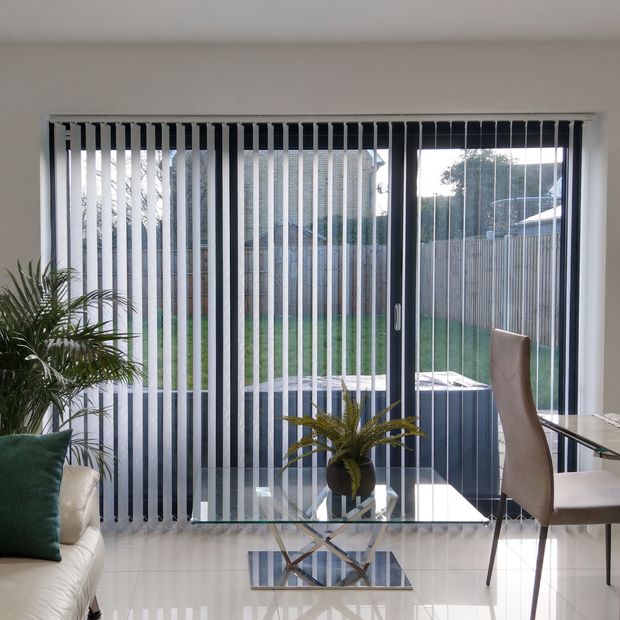 Tempest white vertical blinds in dining room