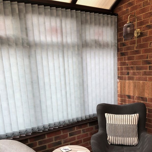 Cubes white vertical blinds in conservatory
