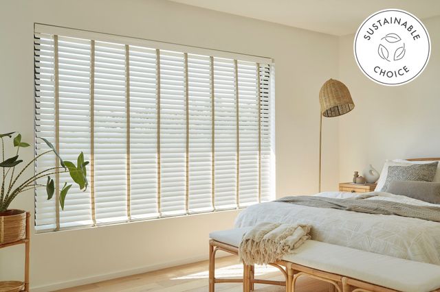 house beautiful white wooden blinds in bedroom
