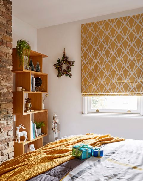 Dimension beam roman blinds in christmas themed bedroom