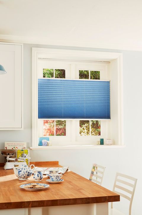 Thermashade top down bottom up blue blinds in dining room window