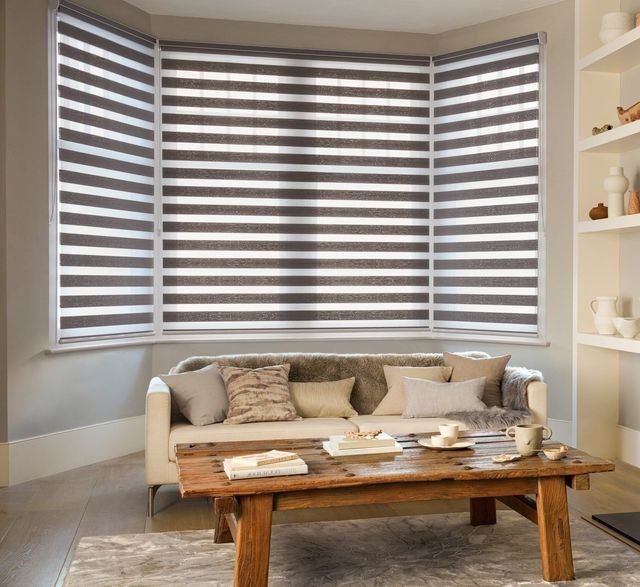 Day and night daybreak taupe blinds in living room