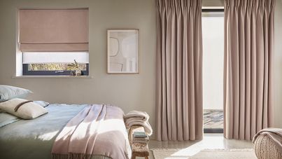 Solace sheer roman blinds paired with serene mauve curtains