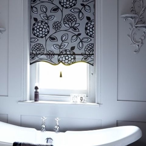Black and white Serena Monochrome roller blind hung in bathroom