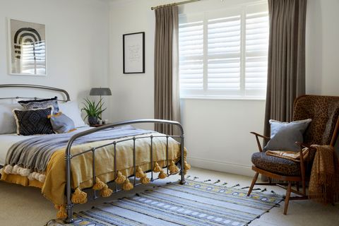 full height silk white shutters paired with lindora charcoal curtains