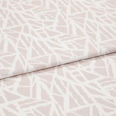 A folded piece of fabric with Alder Rosewater Pink printed on it