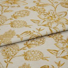 A folded piece of fabric with Anika Golden printed on it