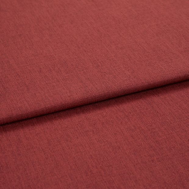 A folded piece of fabric with Bailey Chilli Red printed on it