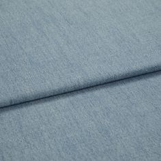 A folded piece of fabric with Bailey Stone Blue  printed on it