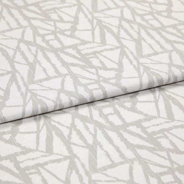 A folded piece of fabric with Alder Grey Silver printed on it